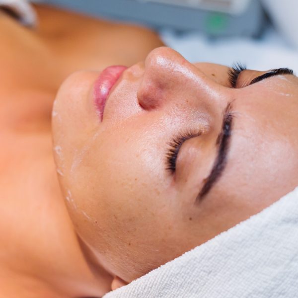young-woman-lying-cosmetologist-s-table-rejuvenation-procedure